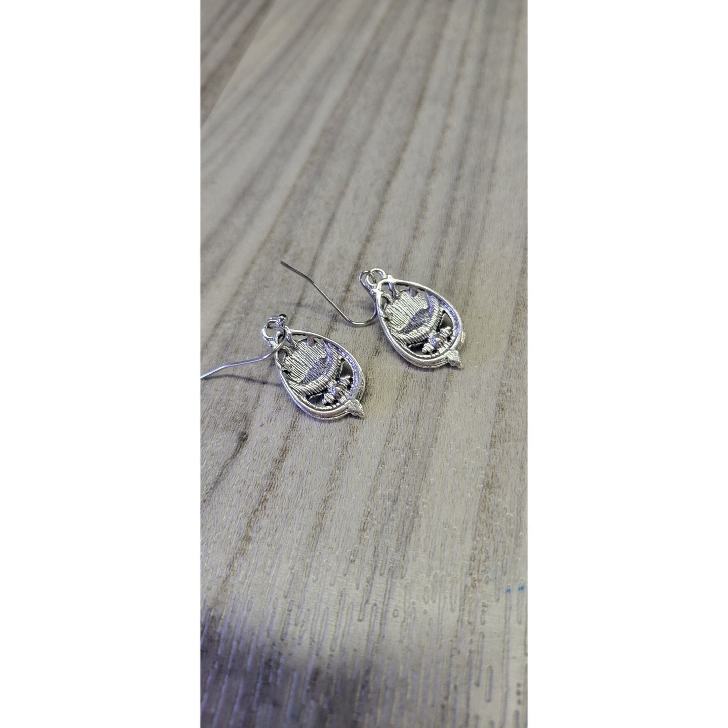 Sliver dangle earrings with blue stones