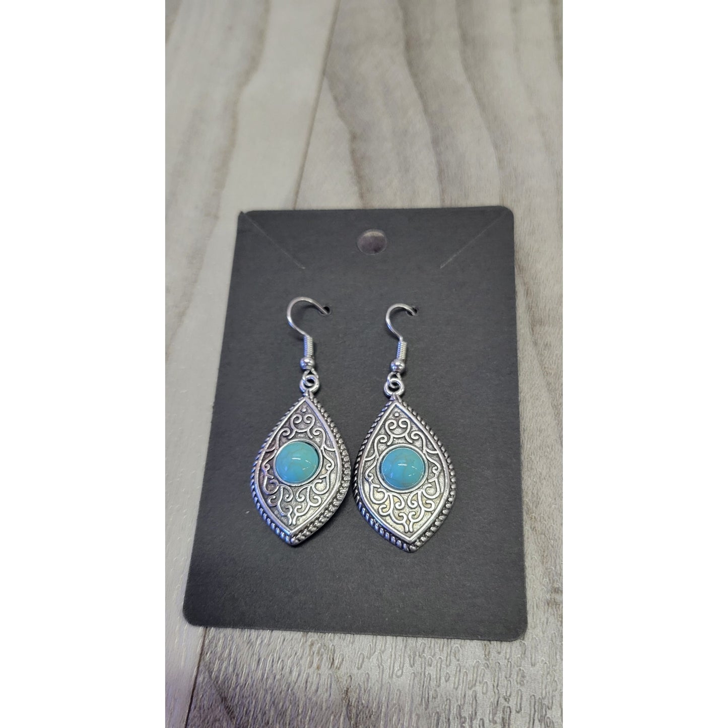 Silver and turquoise dangle earrings